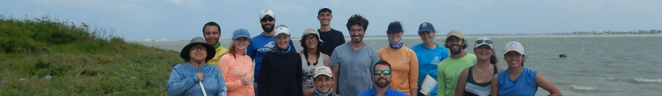 Marine GEI group photo on the beach 